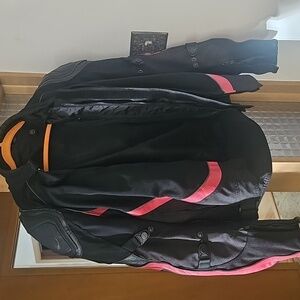 Stylish Black Motorcycle Jacket with Red Accents